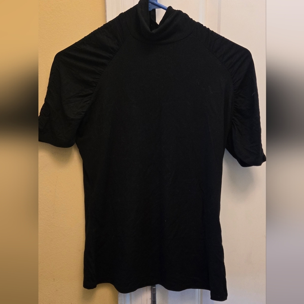 The Limited Black Turtleneck Blouse Short Sleeve With Gathering On Sleeves.